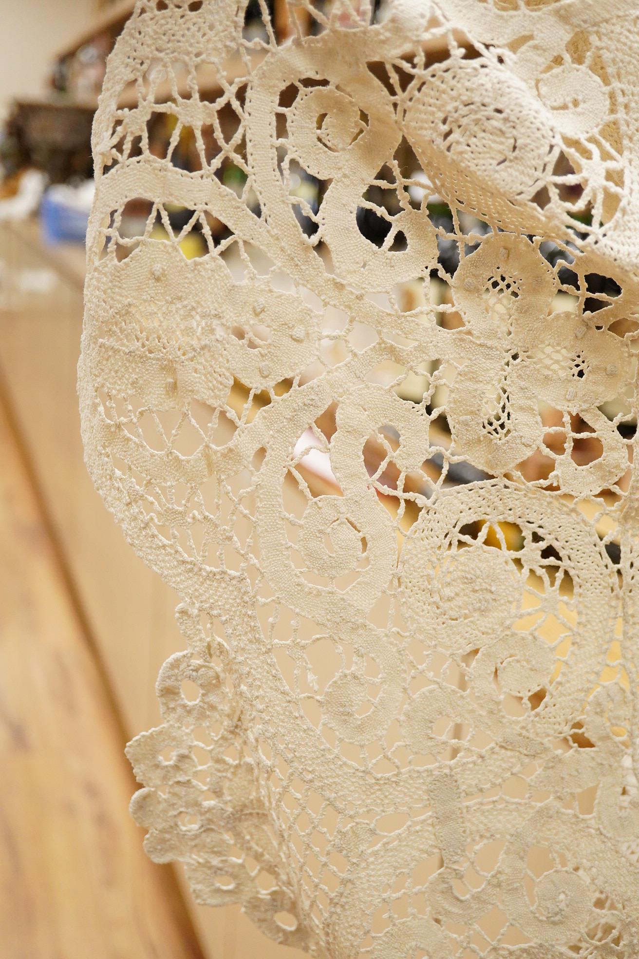 Two ornately designed tape lace bed covers, white cover 152cm x 236cm, beige cover 176cm x 364cm